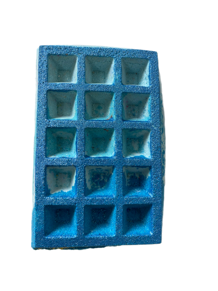 Aquarius waffle bath bomb in blue with painted bright blue bio degradable glitter 